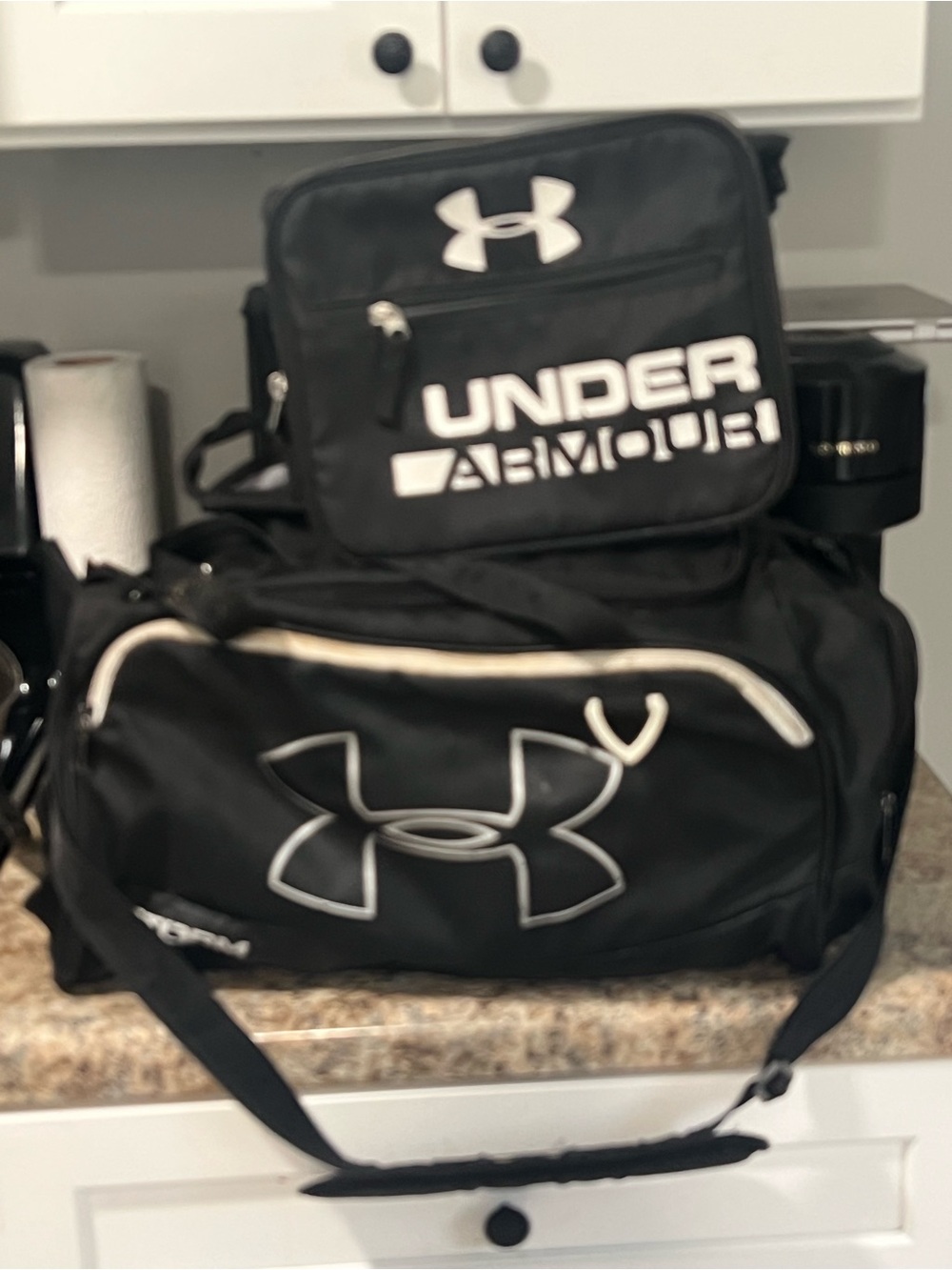 Under Armour Black Duffel Bag with White Logo Accent with matching lunch box